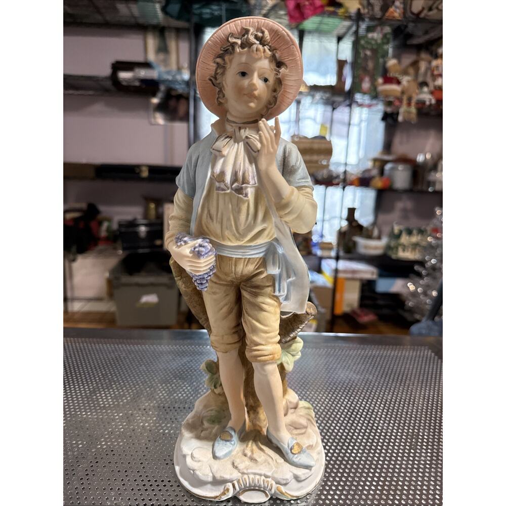 Vintage 1964 Narco porcelain figurine of a young boy. E 2007